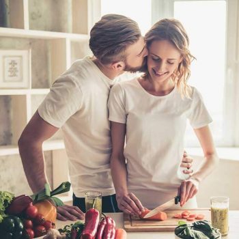Happy young couple in the kitchen