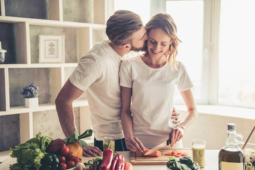 Happy young couple in the kitchen