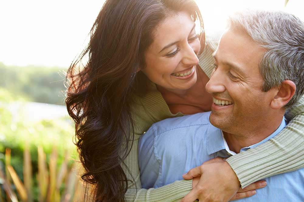 Happy couple enjoying time outdoors