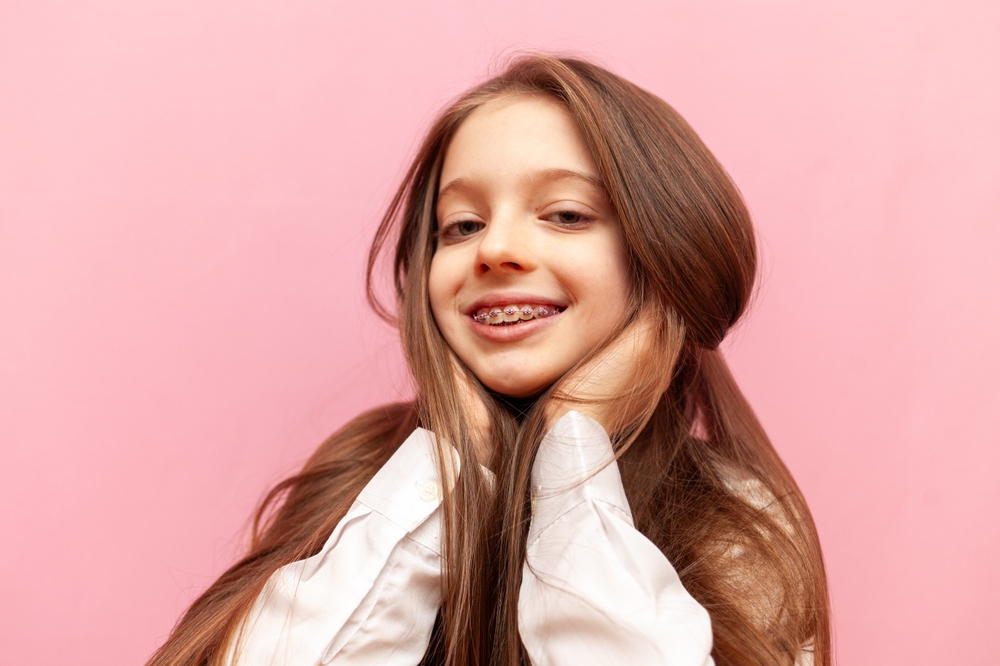 young girl with braces